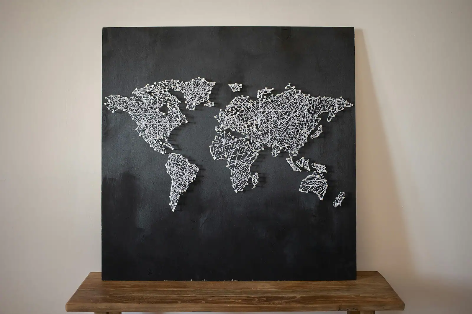 Custom map art hanging on wall