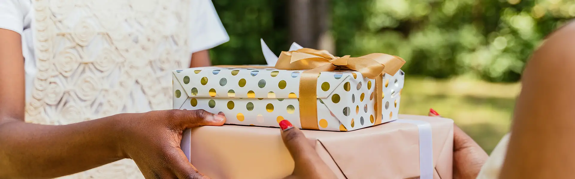 Two people exchanging gifts